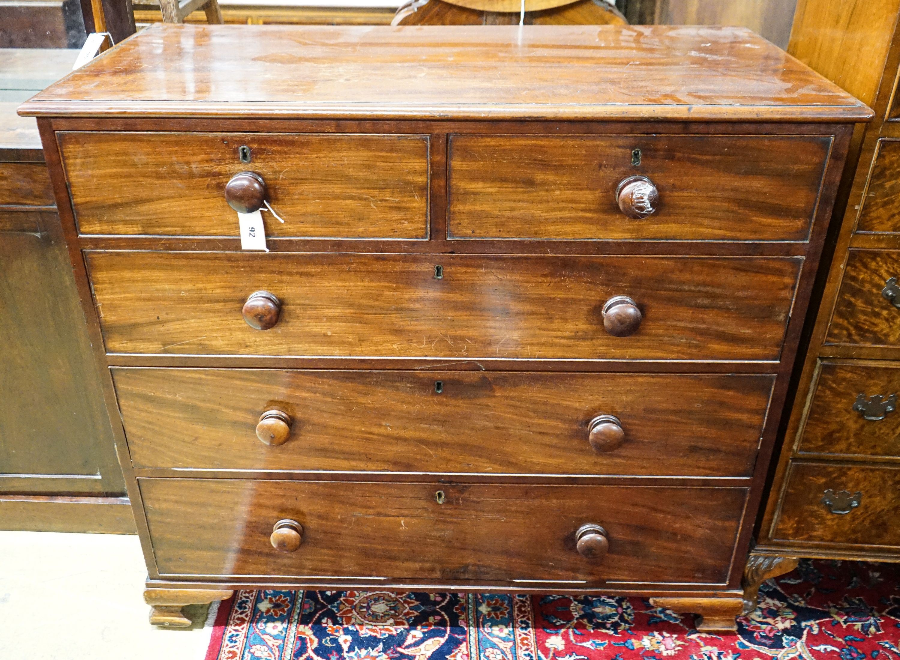 A Victorian mahogany chest fitted two short and three long drawers on bracket feet, width 108cm, depth 53cm, height 96cm